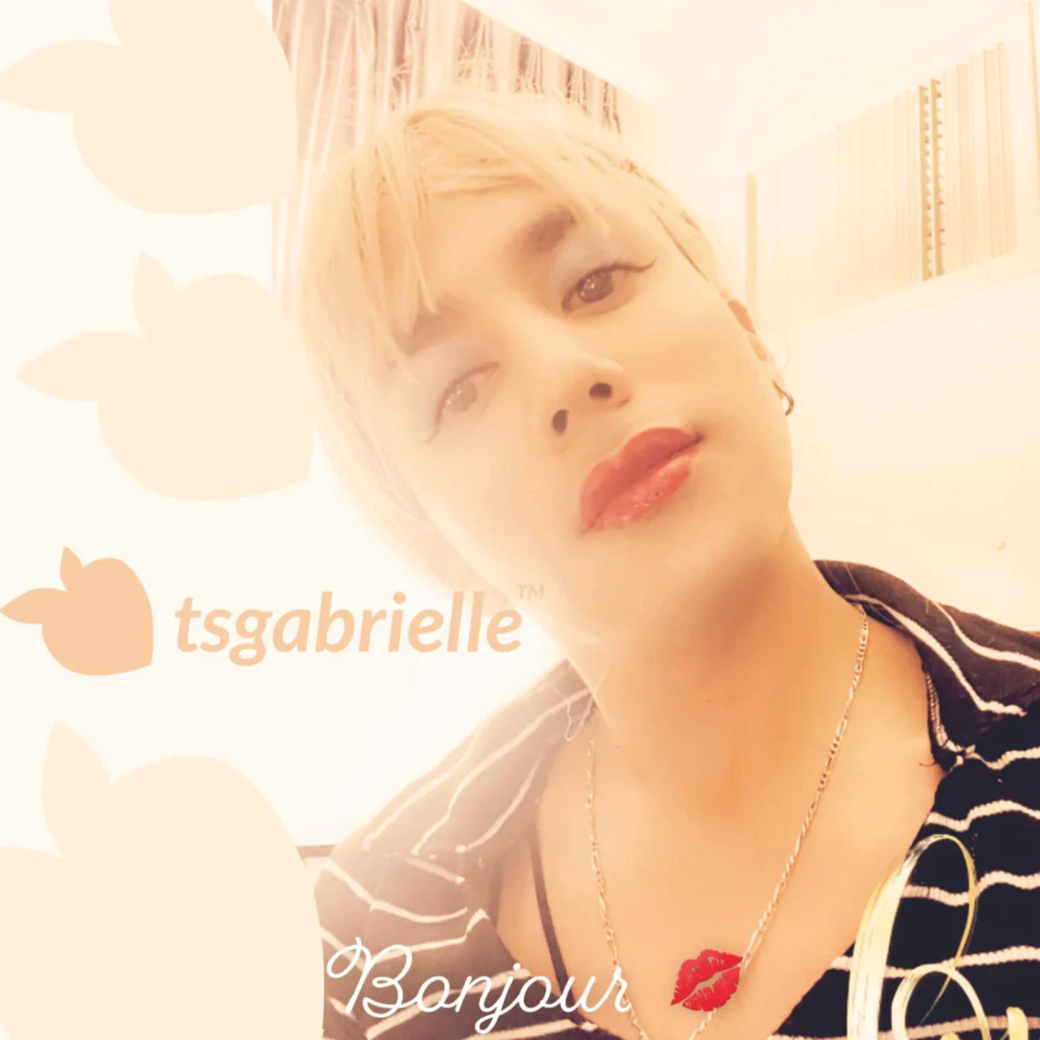 Person with a floral background and 'tsgabrielle' branding