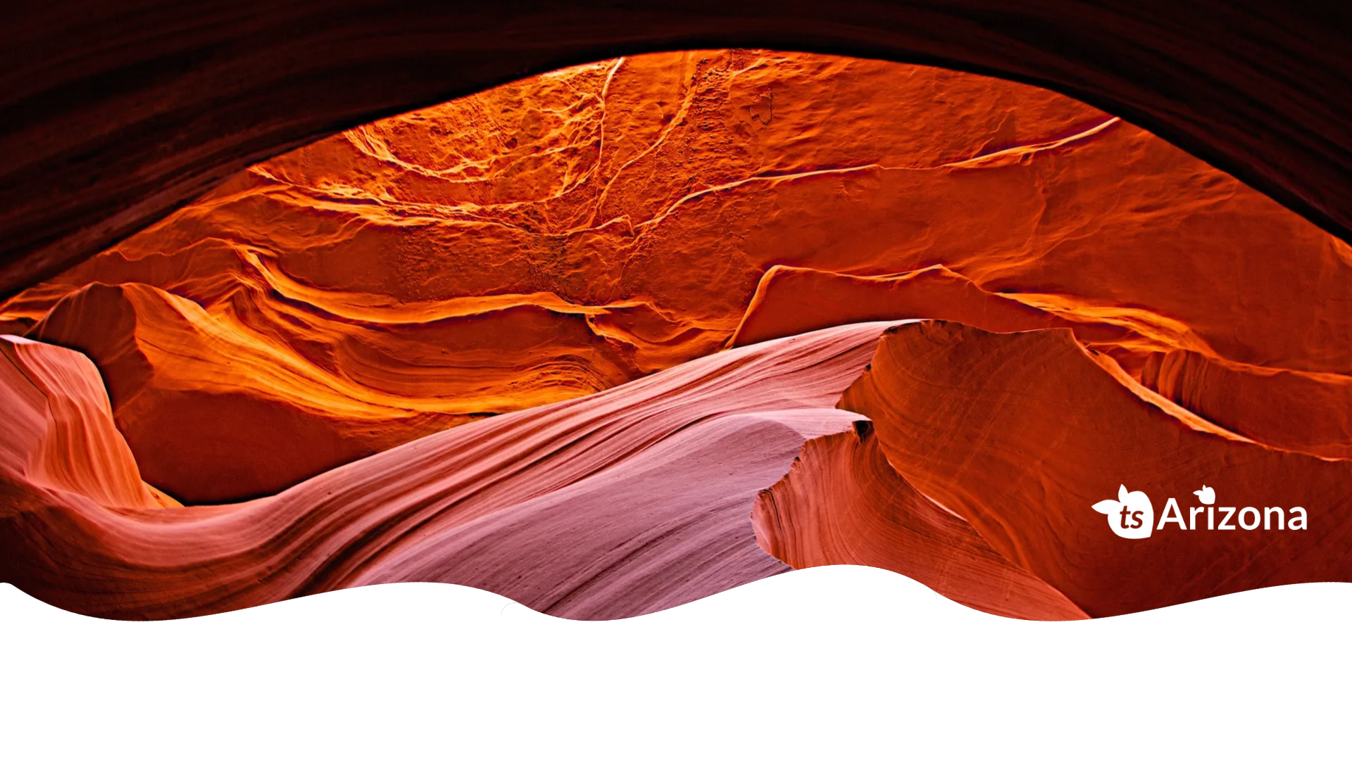 Winding red rock formation with 'Visit Arizona' logo